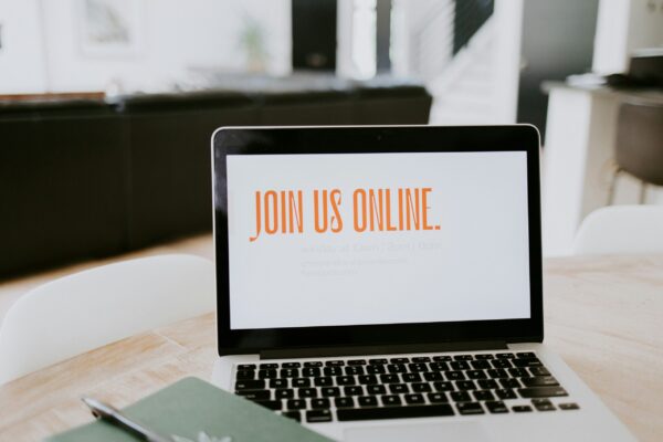 Join us online text on laptop